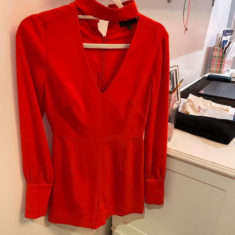 Red vneck long sleeve romper. Great for any occasion!